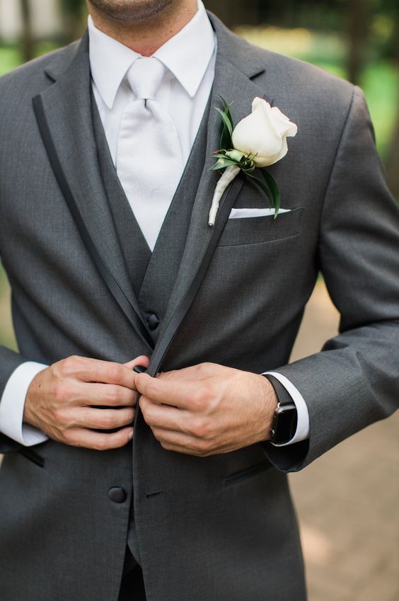 Gorgeous look for the groom for a white wedding. 