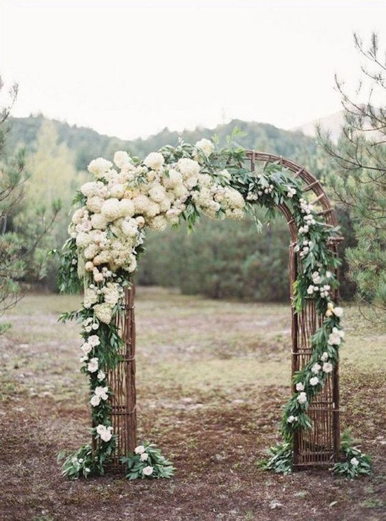 Wild and simple wedding arbor. Good idea for a white oudoor wedding. It has the bohemian vibe. 