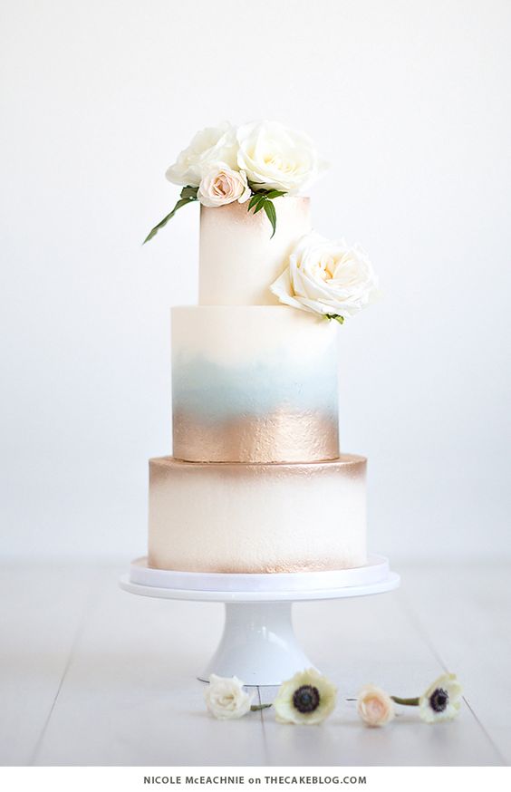 A wedding cake with a little sparkle. This one would look great with Vitality roses. 