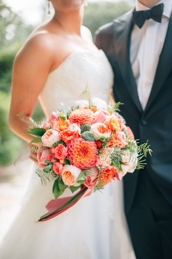  Coral and pink bouquet with dahlias, peonies and roses. 