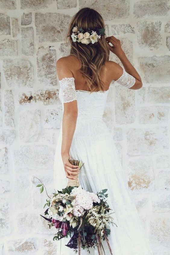 30 mesmerizing wedding hairstyles with flowers - Parfum Flower Company
